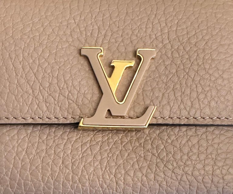 Louis Vuitton Capucines Wallet Taurillon Leather Magnolia in Calf