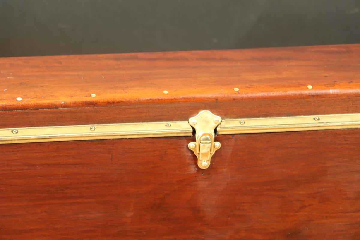 Louis Vuitton trunk
Mahogany and brass
Brass Vuitton lock
Beautiful brass interior compass
Position on the front fenders of an old car and store tools and serves as a foot,
circa 1920s.