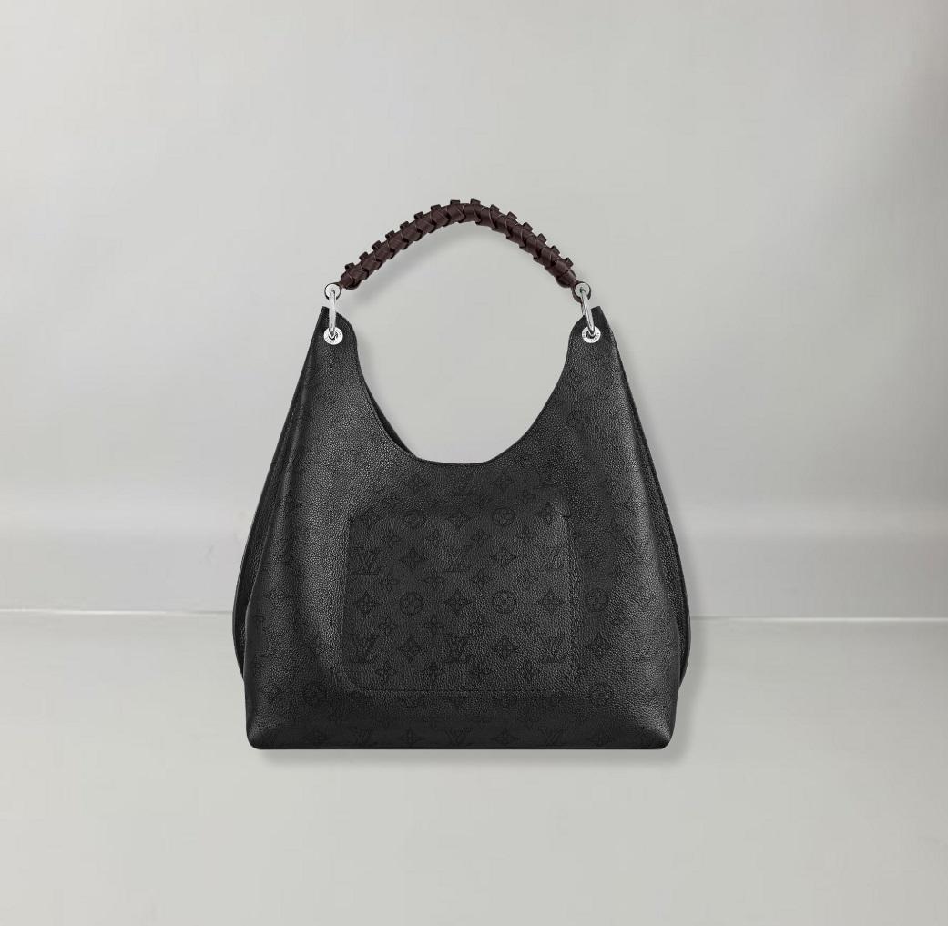 Crafted in Mahina calf leather with Monogram perforations, this Carmel hobo bag is a roomy and lightweight design. Its supple leather and fluid shape make it comfortable to wear. Sophisticated details such as the braided handle and the leather LV