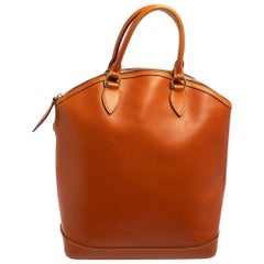 Louis Vuitton - Sac à main vertical Lockit en cuir caramel non fait