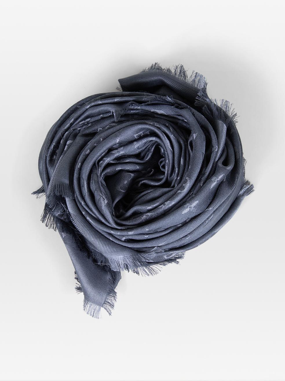 CONDITION is Very good. Minimal wear to the scarf is evident. Discolouration on one side towards the centre of this used Louis Vuitton designer resale item.
 
 Details
 
 
 Model:Monogram Classic Shawl
 
 Carbone
 
 Silk
 
 Shawl
 
 Monogram weave
