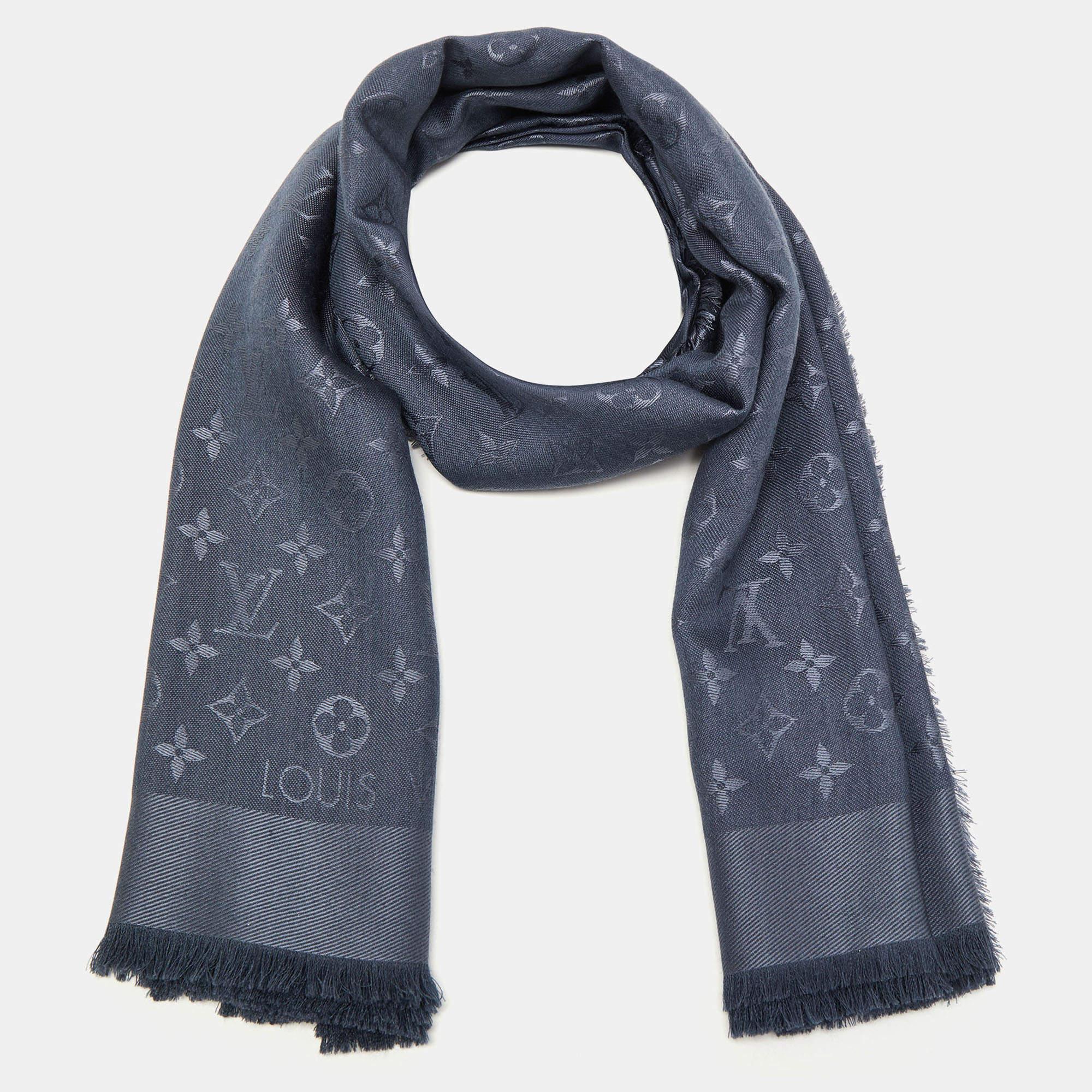 A shawl with fringes on the edges and LV's monogram pattern all over. This Louis Vuitton Logomania scarf made in Italy brings a soft feel and timeless appeal. Wrap it around your neck, and shoulders or style it with your coats and jackets.

