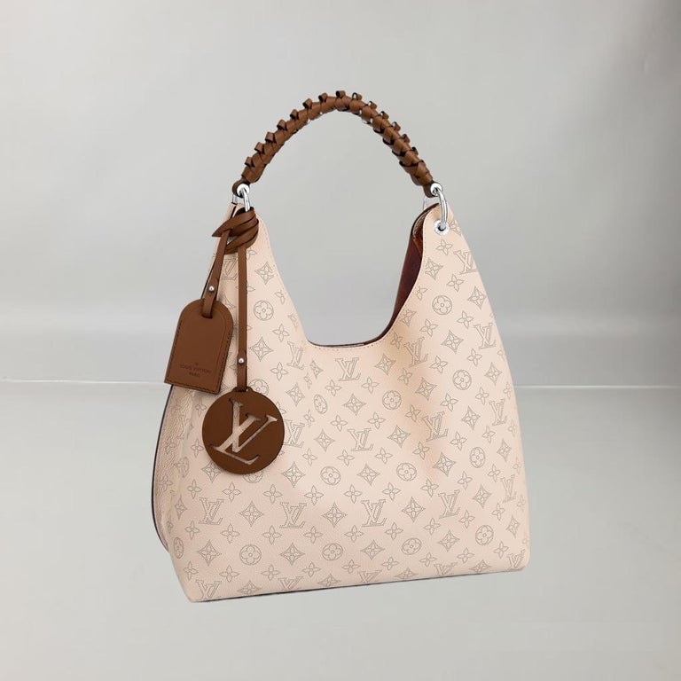 Louis Vuitton Carmel Hobo Creme Mahina Perforated Calf Leather For Sale at  1stDibs