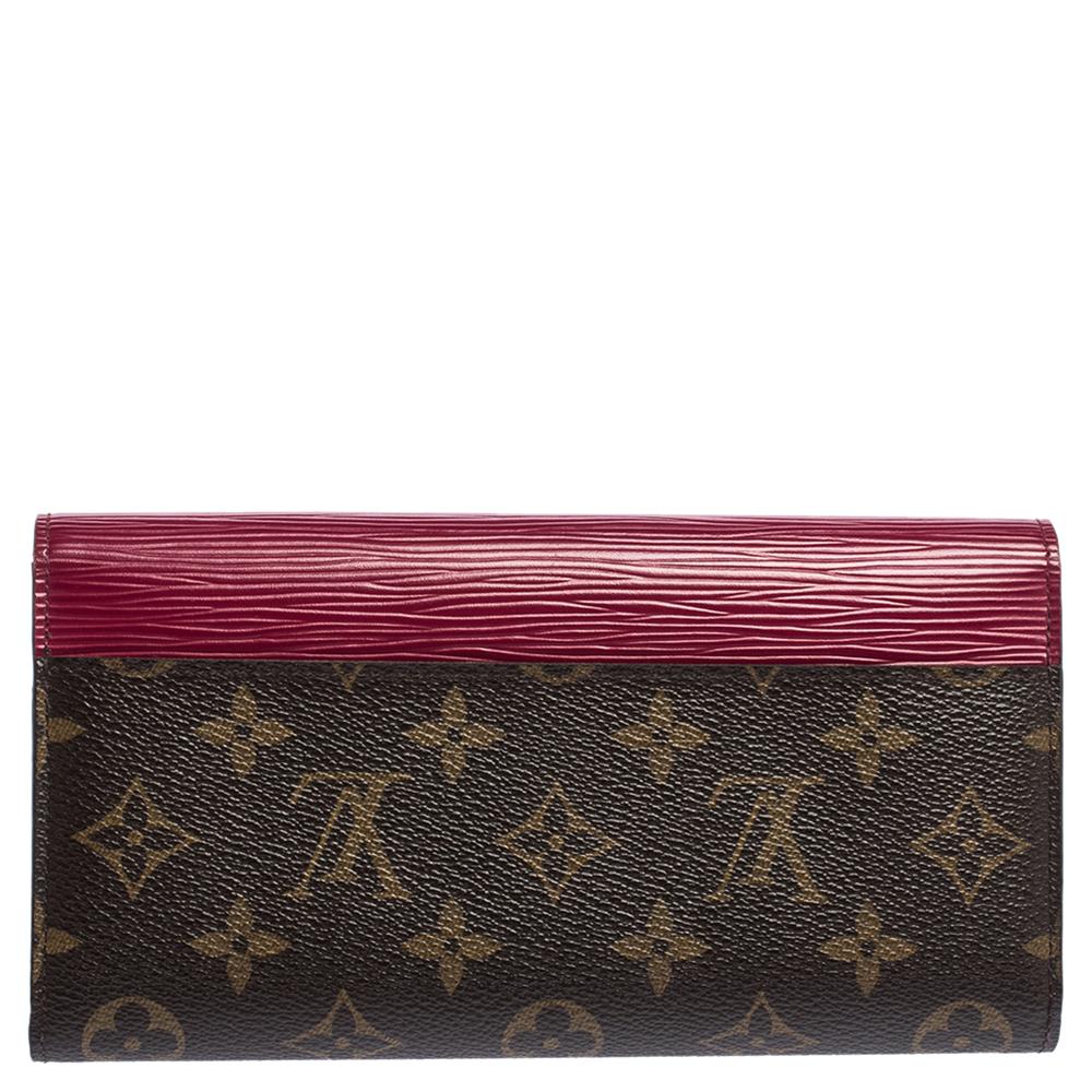 This Marie-Lou wallet comes from the iconic house of Louis Vuitton. It is crafted from monogram canvas and Epi leather, it comes with a flap that opens to a leather-lined interior. It has several slots and compartments and is finished with gold-tone