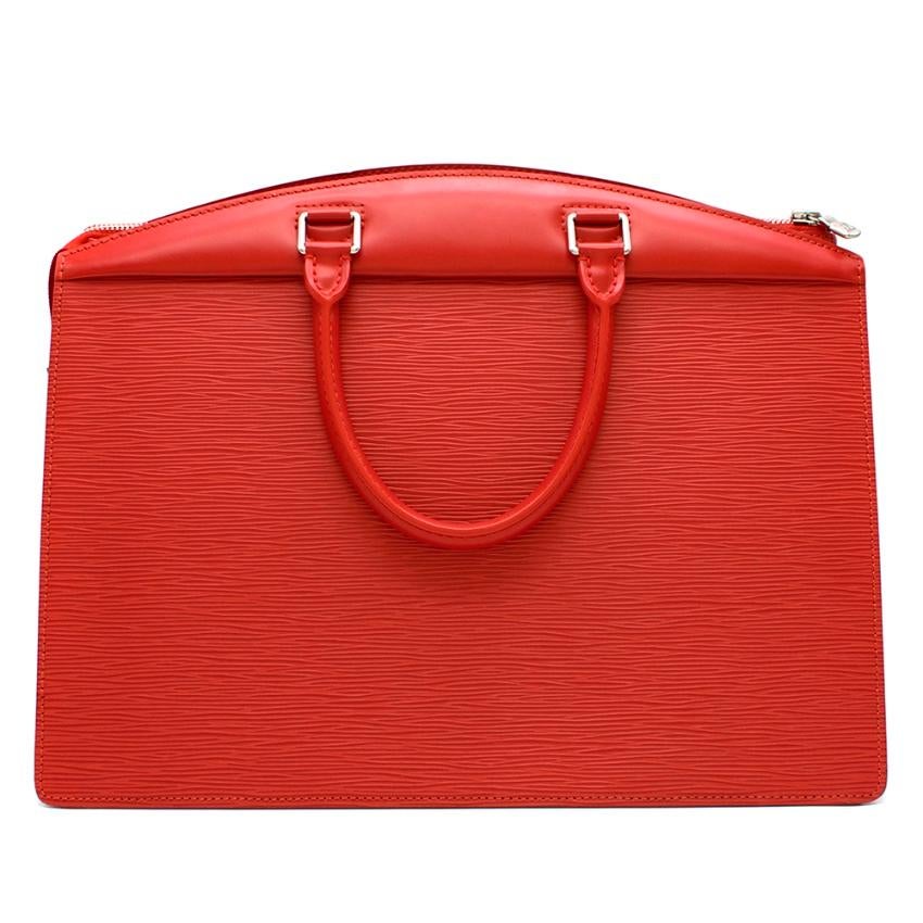 Louis Vuitton Red Riviera Carmine Epi Leather Handbag


This leather handbag from Louis Vuitton, designed by Marc Jacobs, features a tonal structured rectangular body with rounded tops, dual rolled-top handles. There is a single large slit front