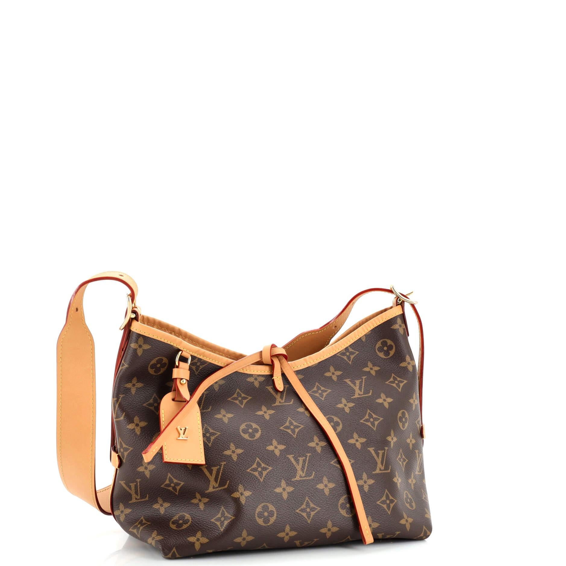 Louis Vuitton CarryAll Hobo Monogram Canvas PM In Good Condition In NY, NY