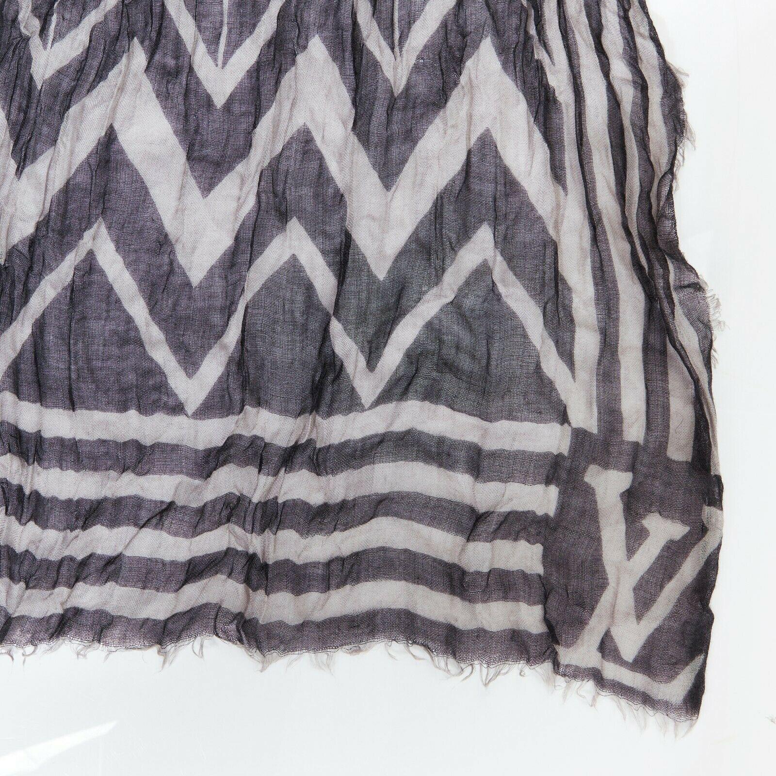 LOUIS VUITTON cashmere silk blend grey black chevron stripe logo frayed scarf Reference: LNKO/A01083 
Brand: Louis Vuitton 
Material: Cashmere 
Color: Grey 
Pattern: Striped 
Extra Detail: Cashmere, silk. Black and light grey. Chevron and stripe