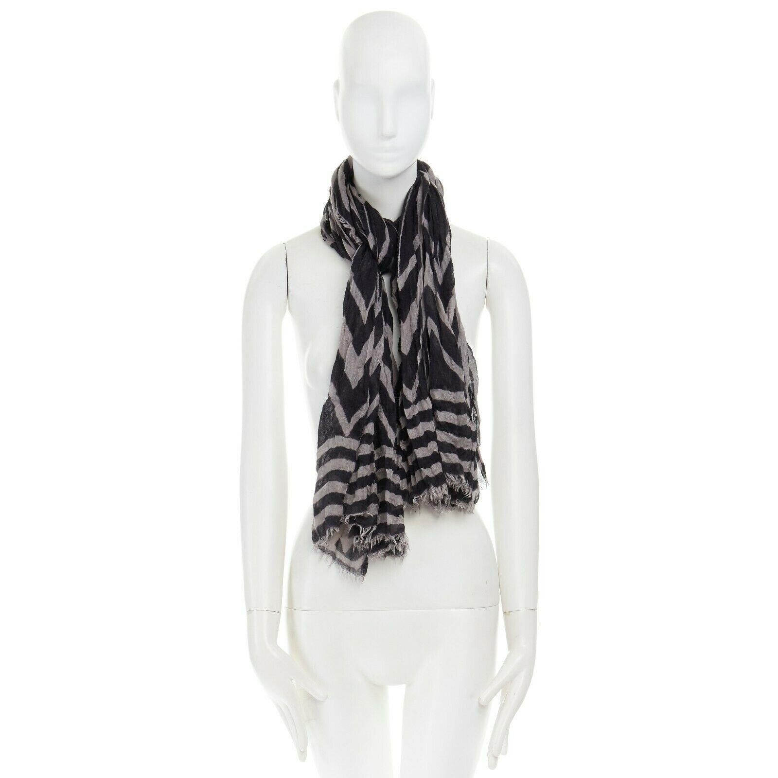 long grey frayed scarf