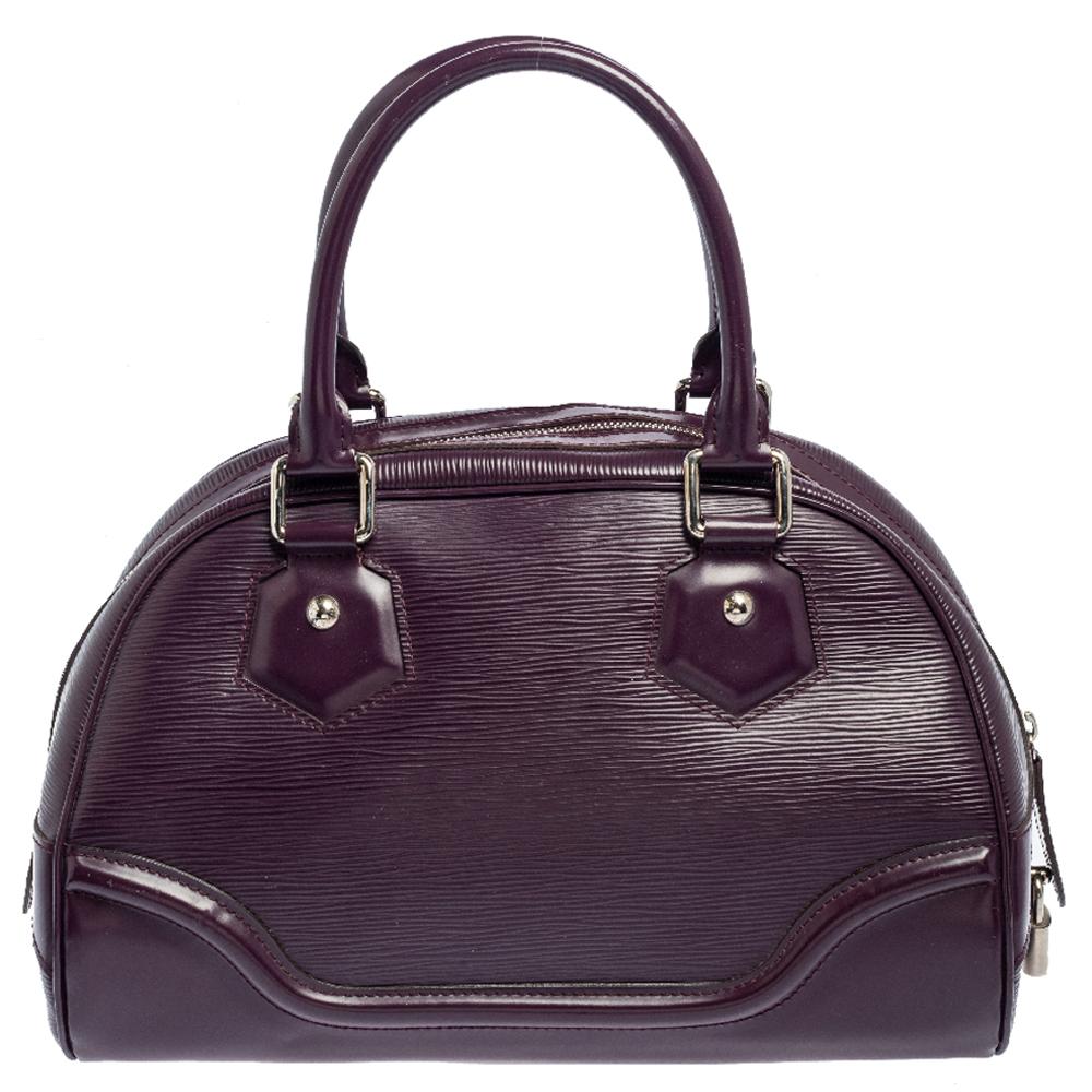 A handbag should not only be good-looking but also functional, just like this Montaigne bag from Louis Vuitton. Crafted from Epi leather, this gorgeous number has a top zipper that opens up to a spacious fabric interior. It features two rolled