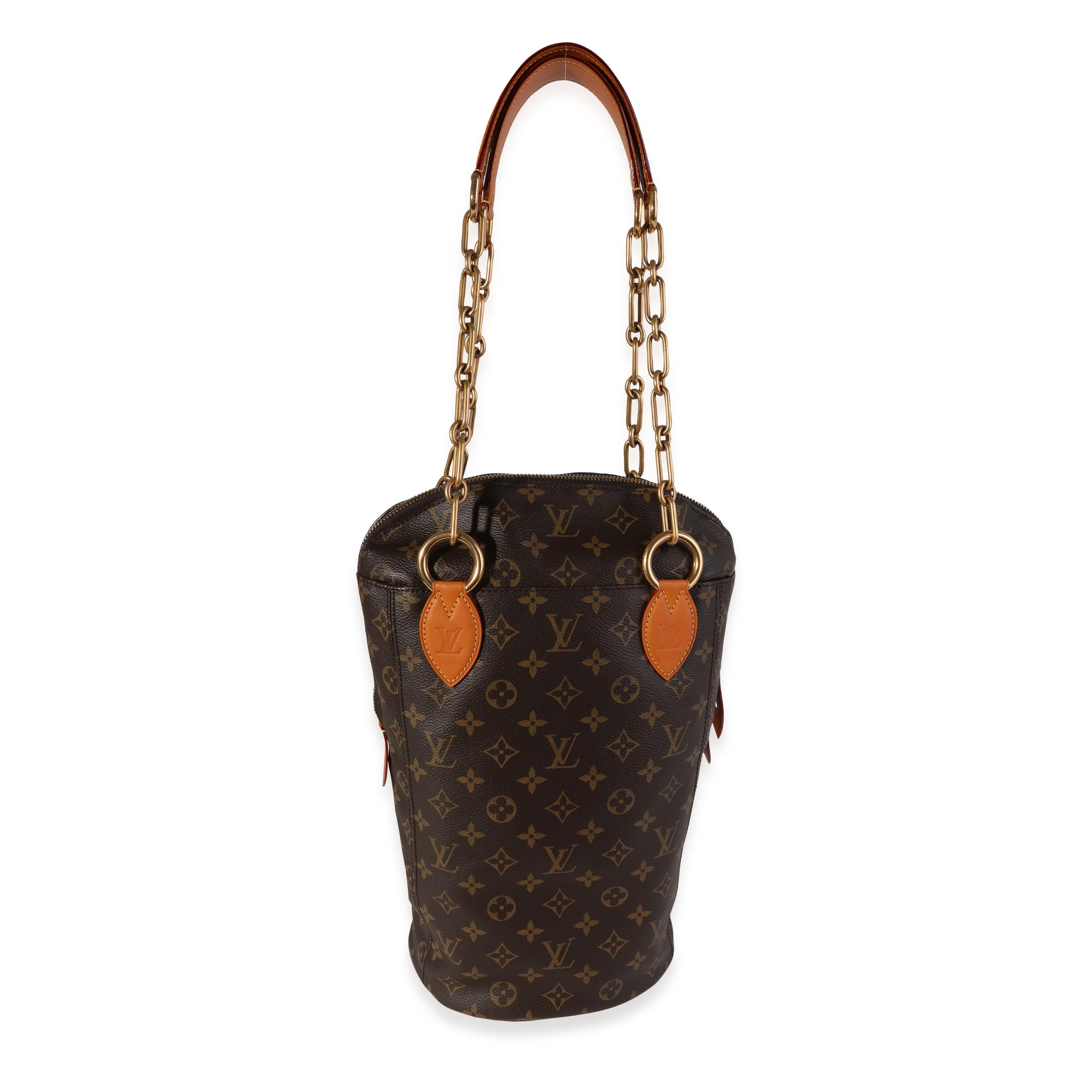 Listing Title: Louis Vuitton Celebrating Monogram Iconoclasts Karl Lagerfeld Punching Bag GM
SKU: 119810
MSRP: 3400.00
Condition: Pre-owned (3000)
Handbag Condition: Very Good
Condition Comments: Very Good Condition. Light marks to leather.