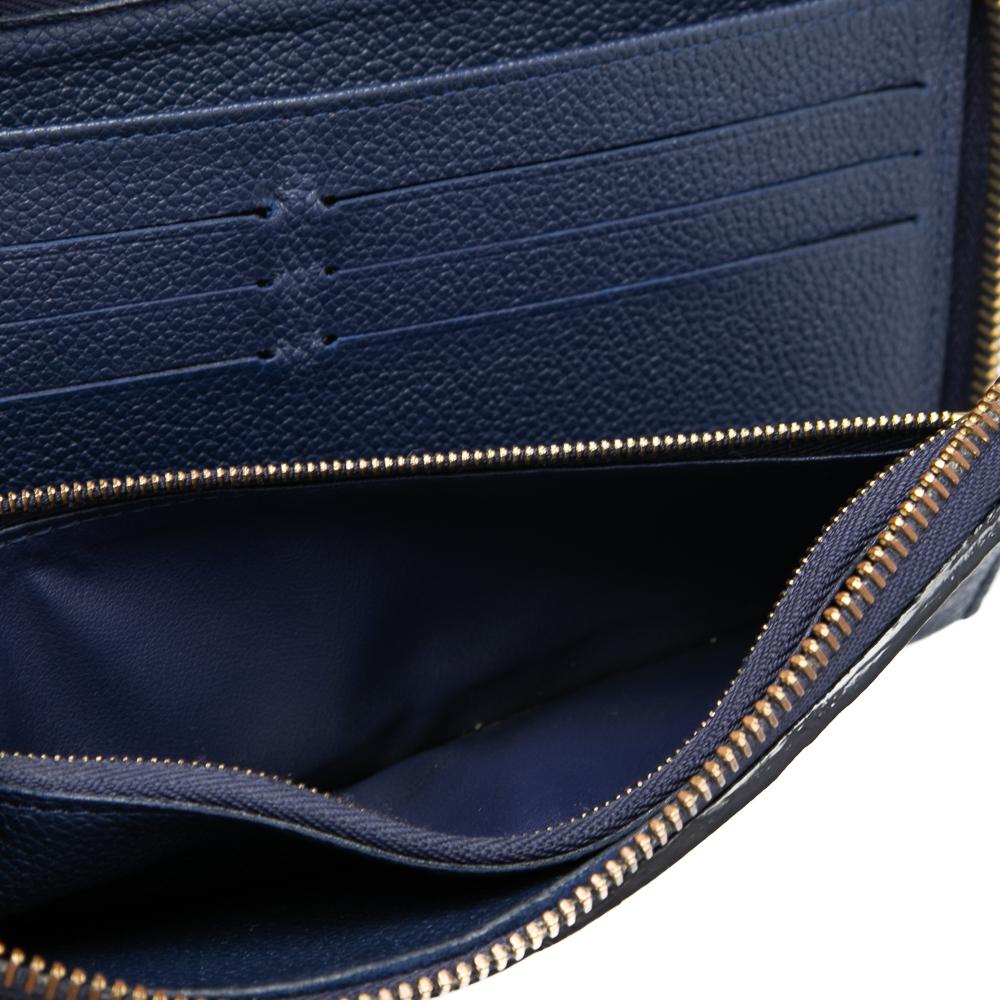 Women's Louis Vuitton Celeste Monogram Empreinte Leather Zippy Wallet