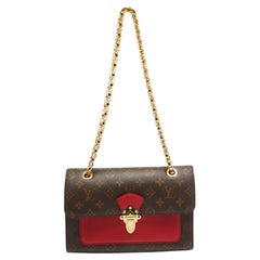 Louis Vuitton Cerise Monogramm Tasche aus Segeltuch und Leder Victoire