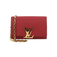 Louis Vuitton Chain Louise Clutch Leather GM at 1stDibs