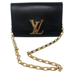 Buy Brand New & Pre-Owned Louis Vuitton Chain Louise Clutch Bag, Black with  Python Detailing Online