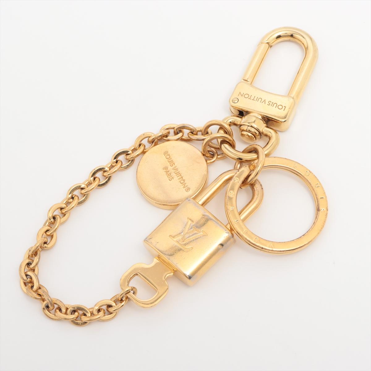 Beige Louis Vuitton: catena con cuore LV e charme per borsa in vendita