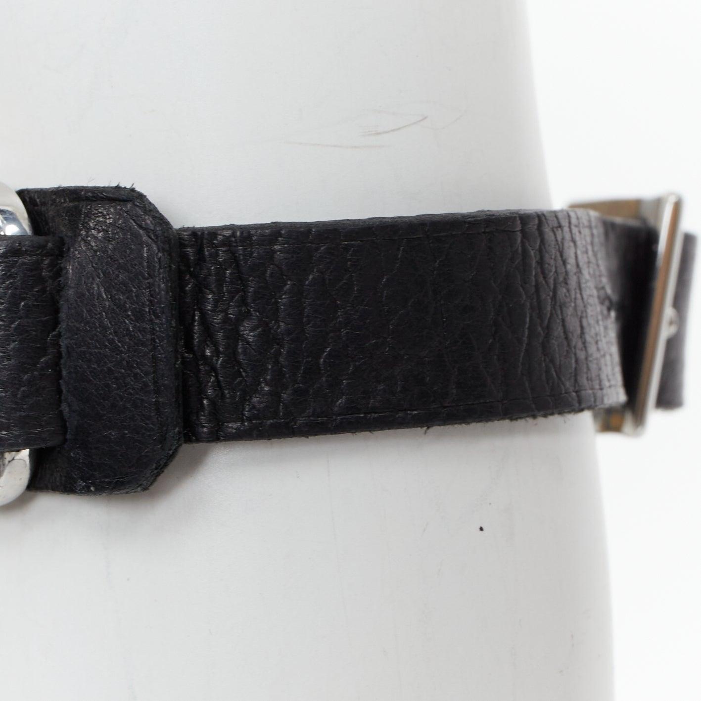 LOUIS VUITTON Champs Elysee black leather floral motif LV metal plate bracelet In Fair Condition For Sale In Hong Kong, NT