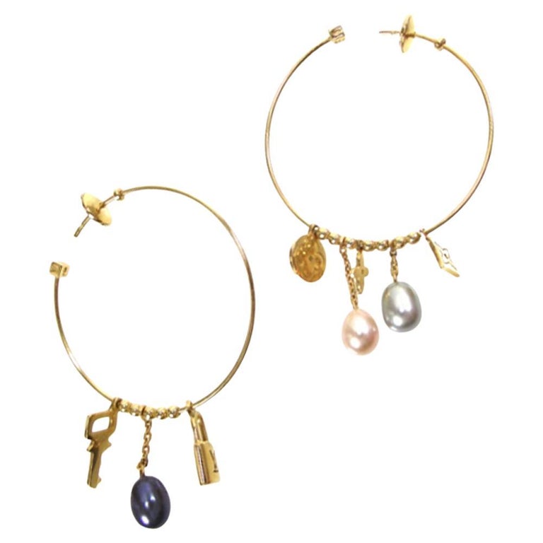 Louis Vuitton Charm and Pearl Hoop Earrings For Sale at 1stDibs  lv hoop  earrings, louis vuitton pearl earrings, louis vuitton hoop earrings