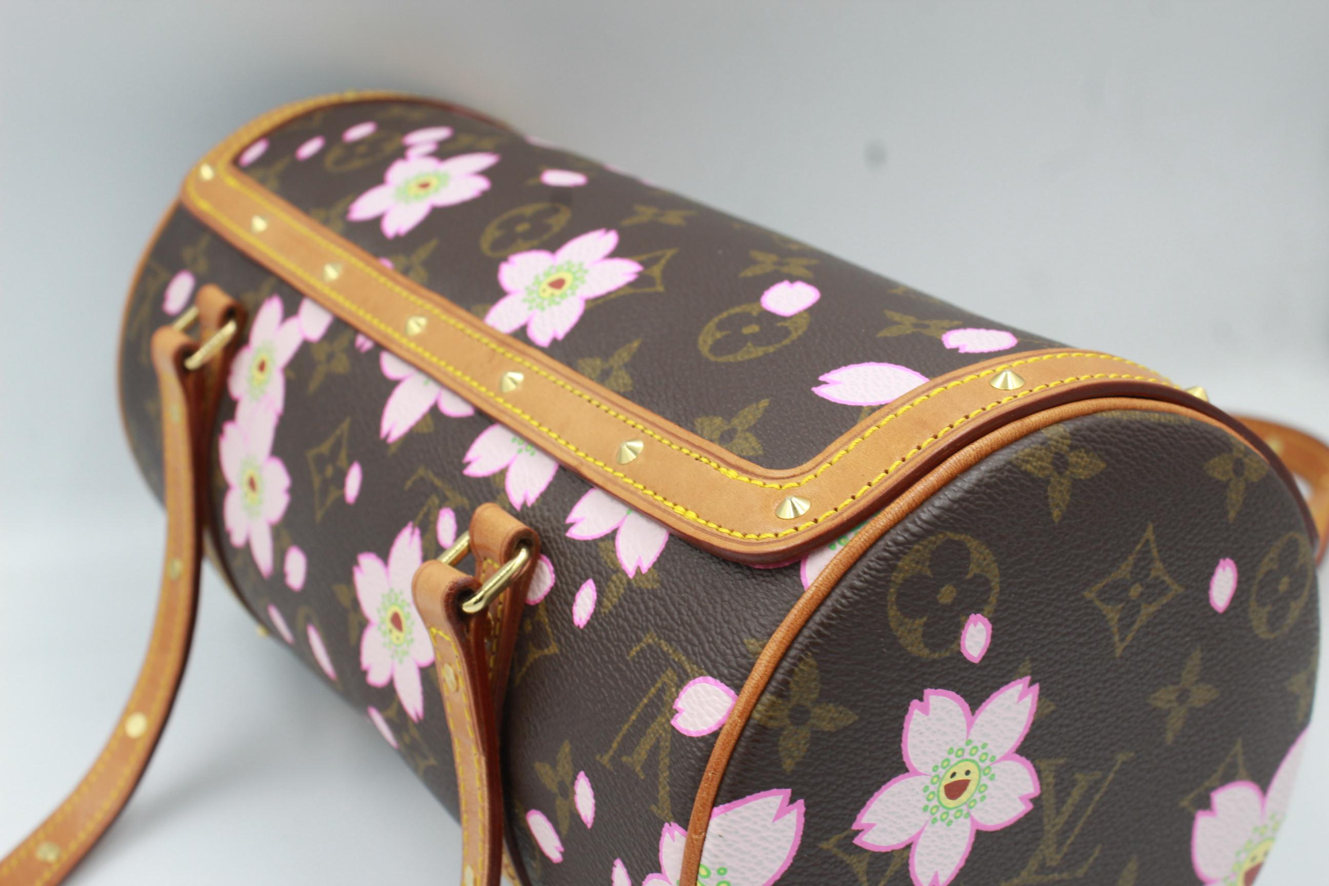 Louis Vuitton Cherry Blossom by Takashi Murakami papillon bag.
Good condition, sold with its padlock and keys.
Rare piece. 
14cm x 27cm x 14cm 