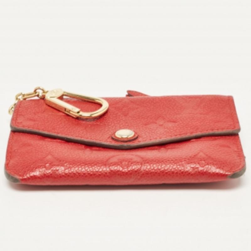 Louis Vuitton Kirschbaum Empreinte Leder-Schlüsselbeutel (Orange) im Angebot