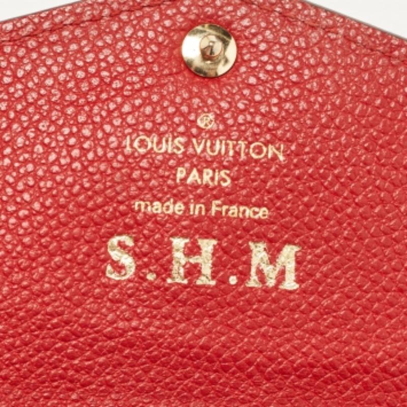 Louis Vuitton Kirschbaum Empreinte Leder-Schlüsselbeutel im Angebot 2