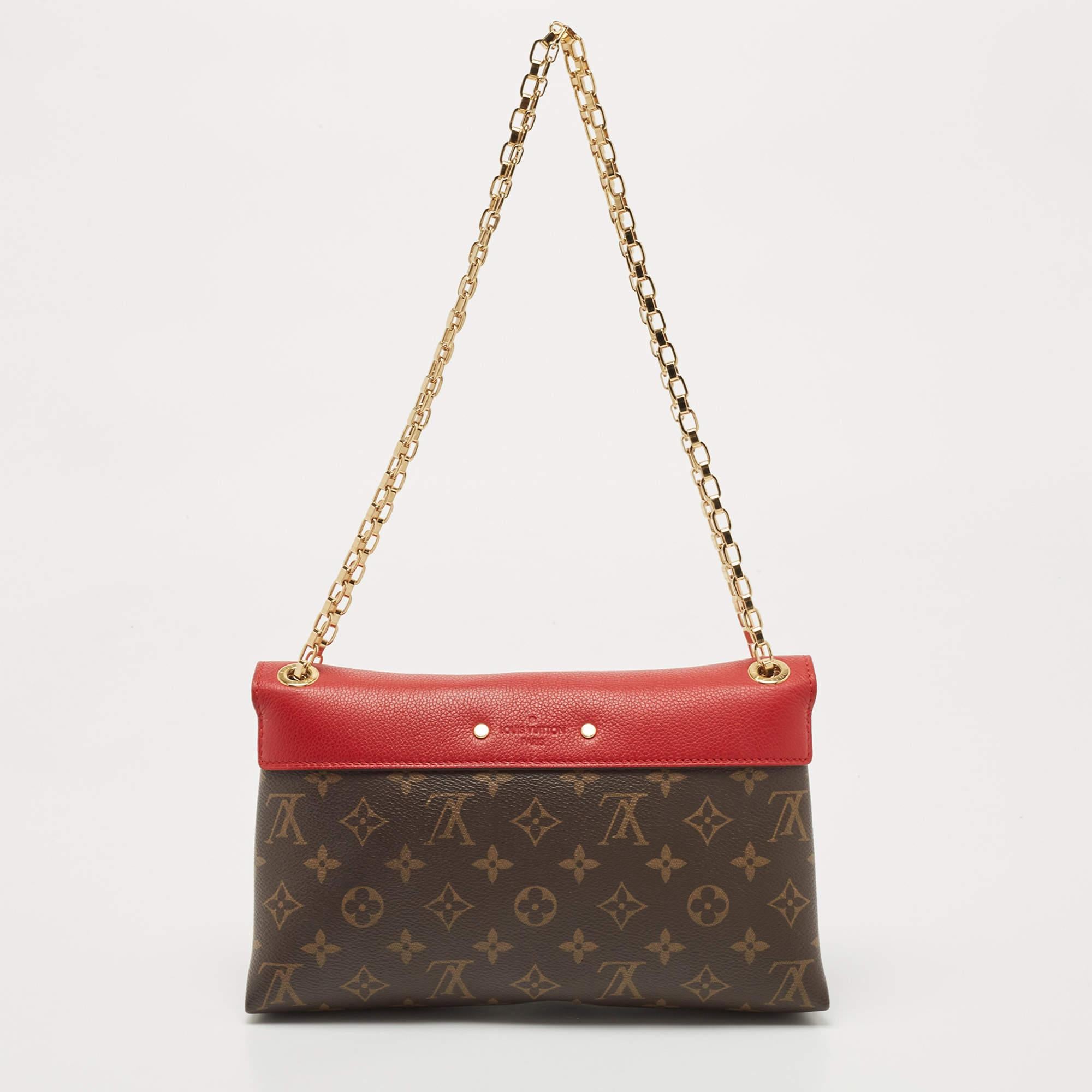 The classy silhouette and the use of Monogram canvas and leather for the exterior bring out the appeal of this Louis Vuitton shoulder bag. It features a sliding chain handle, gold-tone hardware, and an Alcantara-lined interior.

