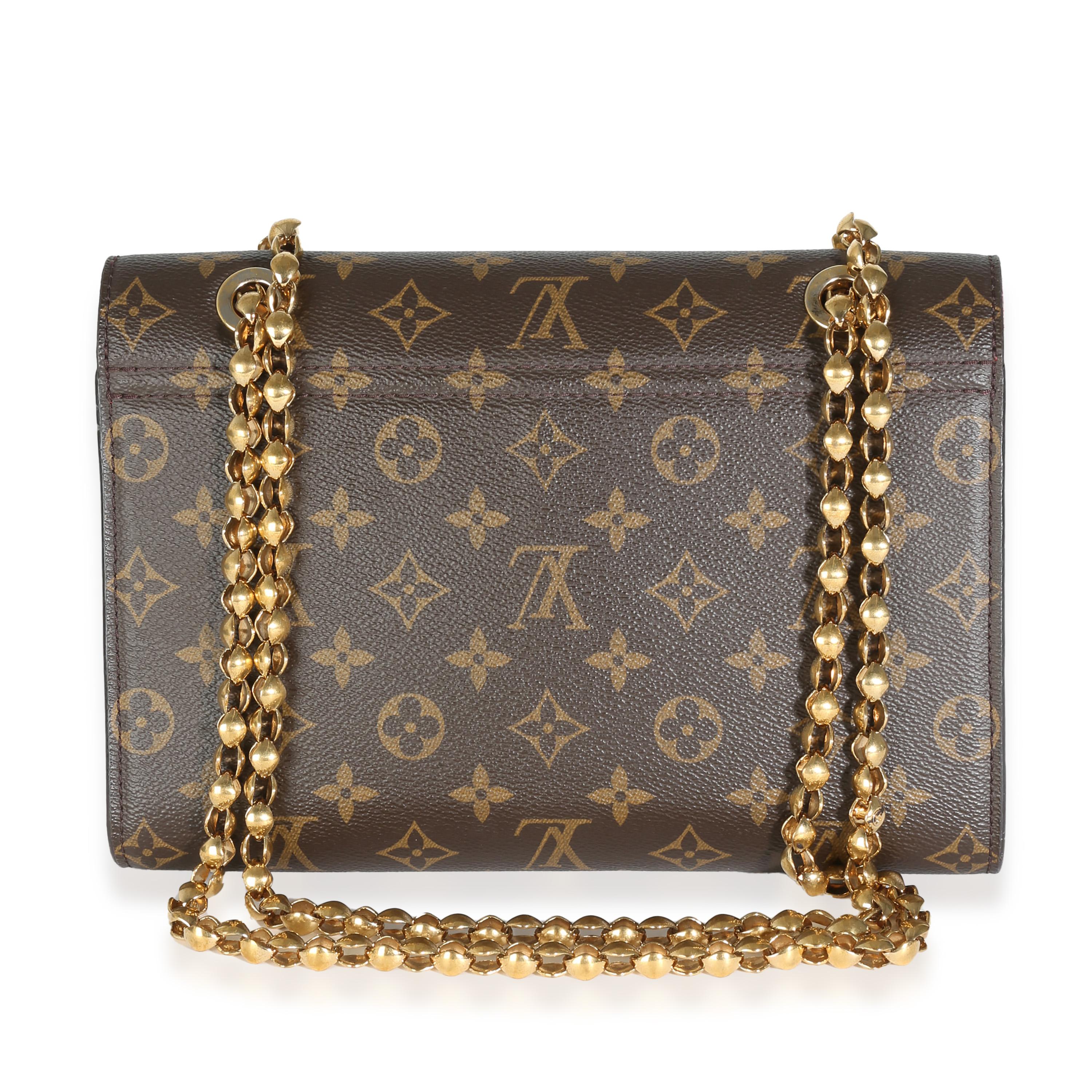 Listing Title: Louis Vuitton Cherry Monogram Canvas Victoire
SKU: 142293
Condition: Pre-owned 
Handbag Condition: Very Good
Condition Comments: Item is in very good condition with minor signs of wear.  Scuffing along corners and along front.