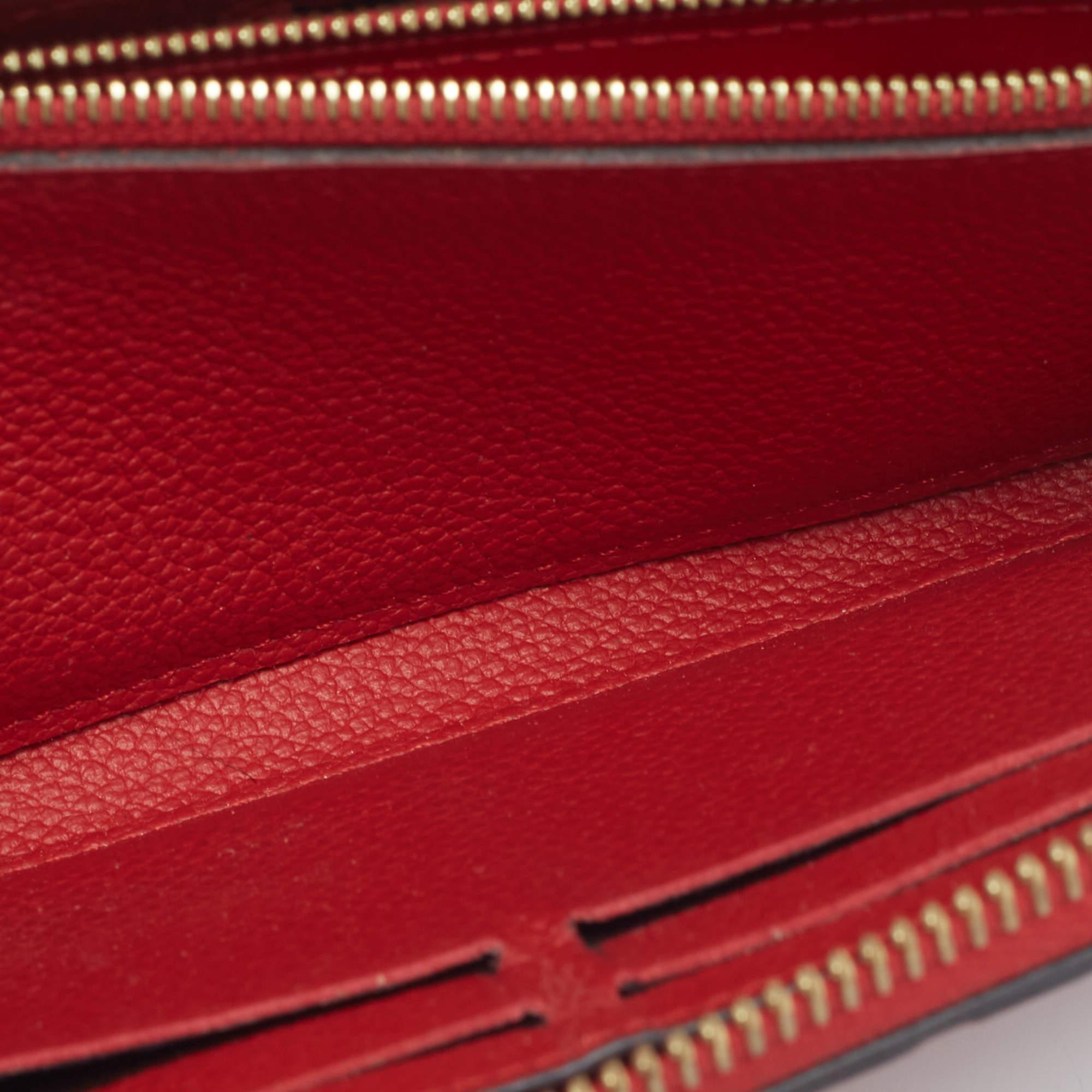 Rosso Louis Vuitton Portafoglio Clemence in Pelle Empreinte con Monogram Ciliegia in vendita