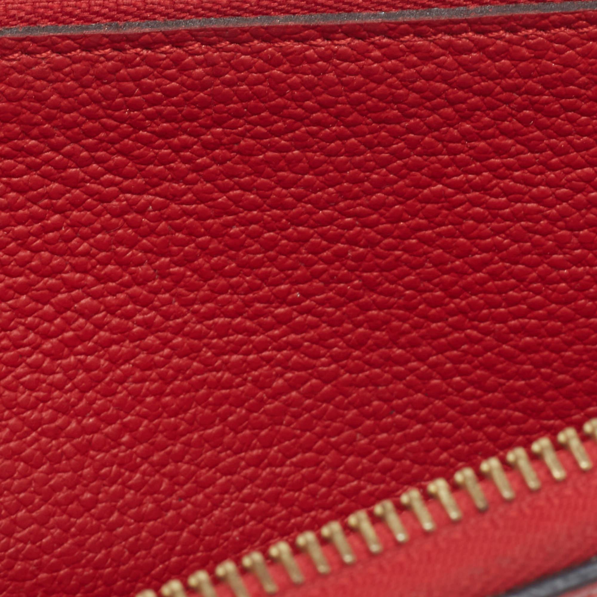 Louis Vuitton Portafoglio Clemence in Pelle Empreinte con Monogram Ciliegia in vendita 4