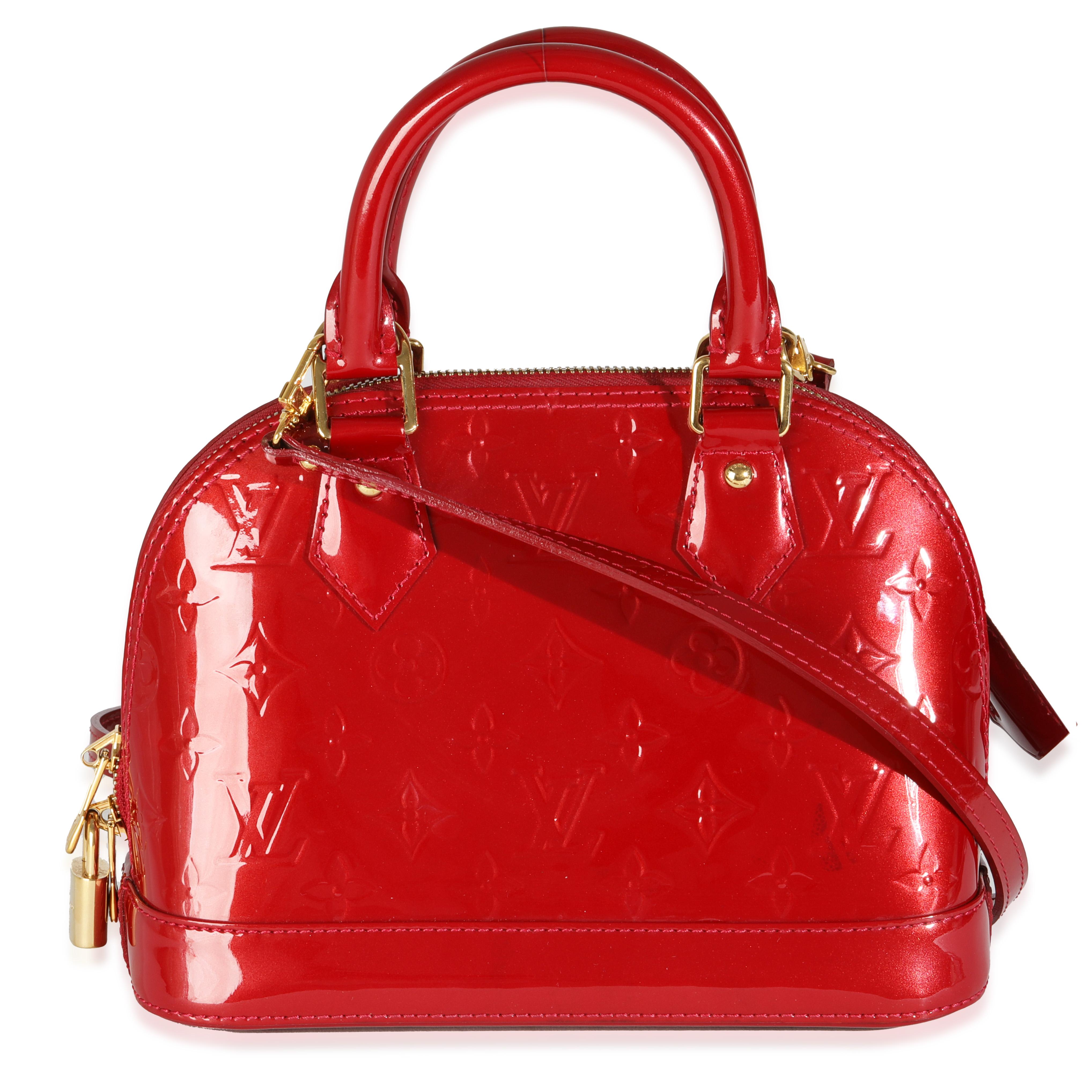 Listing Title: Louis Vuitton Cherry Monogram Vernis Alma BB
SKU: 145001
Condition: Pre-owned 
Condition Description: Introduced in 1992, the history of the Alma bag from Louis Vuitton actually goes back way further in time. The tote bag is based on