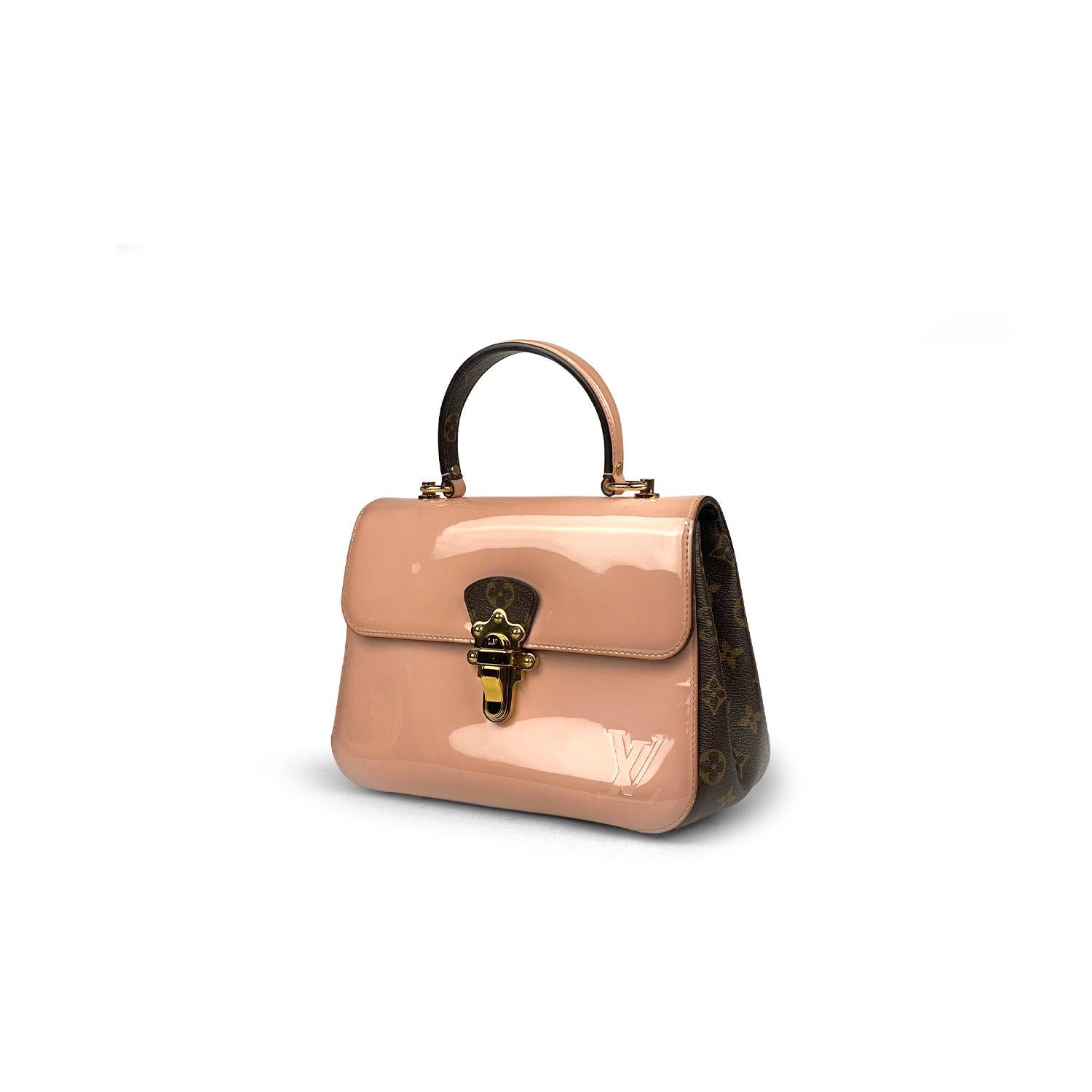 Miroir Vernis patent leather Louis Vuitton Cherrywood PM Crossbody bag with

- Smooth patent cowhide leather
- Textile lining
- Smooth patent cowhide leather & Monogram coated-canvas trim
- Golden-finish hardware
- Inside zipped pocket and flat