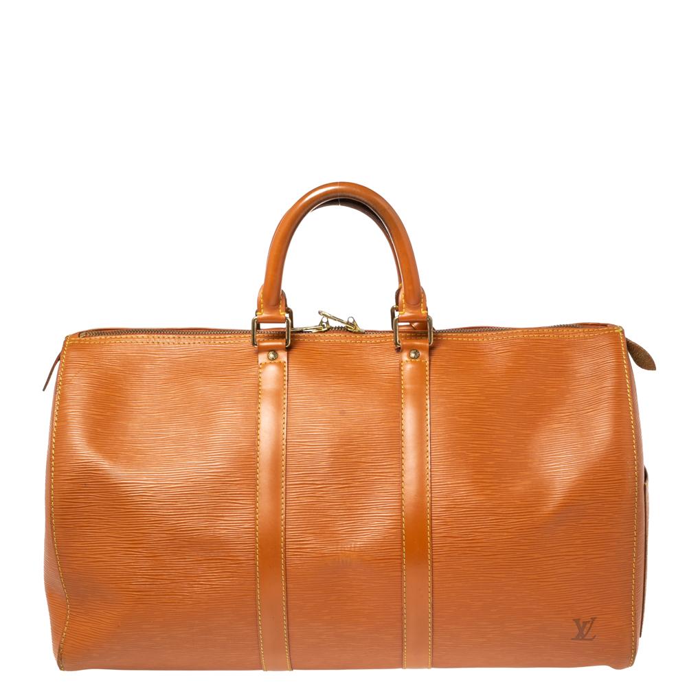 Fashion lovers naturally like to travel in style and at such times only the best travel handbag will do. That's why it is wise to opt for Louis Vuitton's Keepall as it is well-crafted from Epi leather to endure and well-designed to grace you with