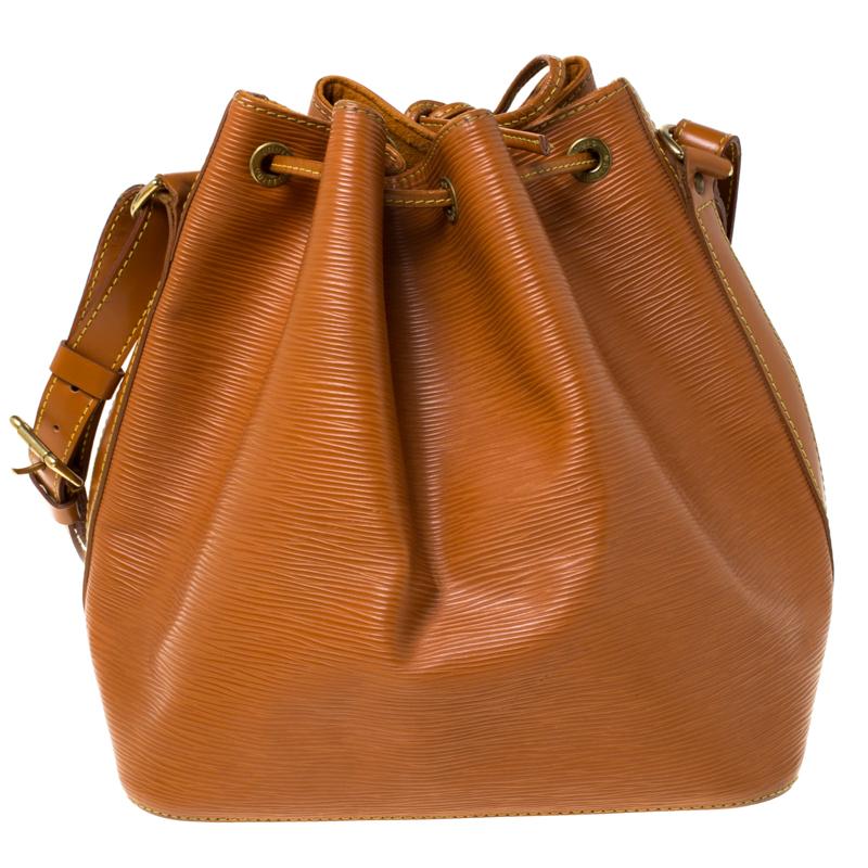 First created in 1932 by Louis Vuitton to carry bottles of Champagne, the iconic Noe now serves as a stylish daytime handbag. Crafted from epi leather, the bag exudes just the right amount of sophistication. It has a single adjustable strap with