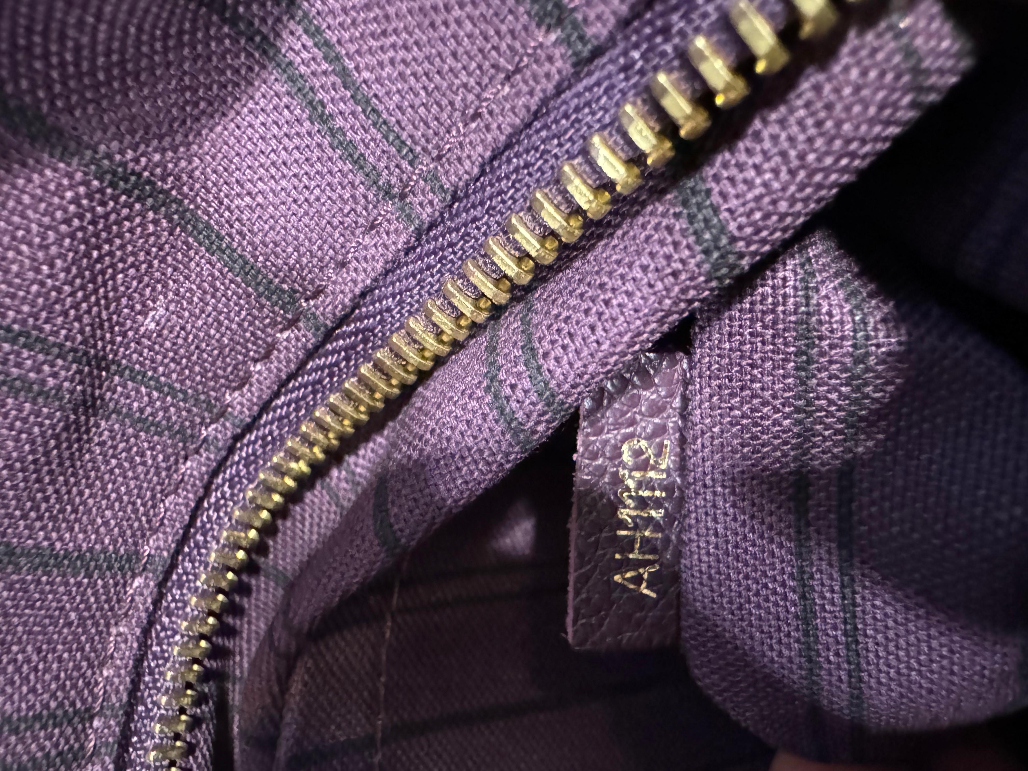 Louis Vuitton Citadine PM Tote Bag Empreinte

 Color: Purple
DESCRIPTION
Louis Vuitton Tote
From the 2012 Collection
Purple Empreinte Leather
Brass Hardware
Flat Handles
Leather Trim Embellishment
Canvas Lining & Three Interior Pockets
Turn-Lock