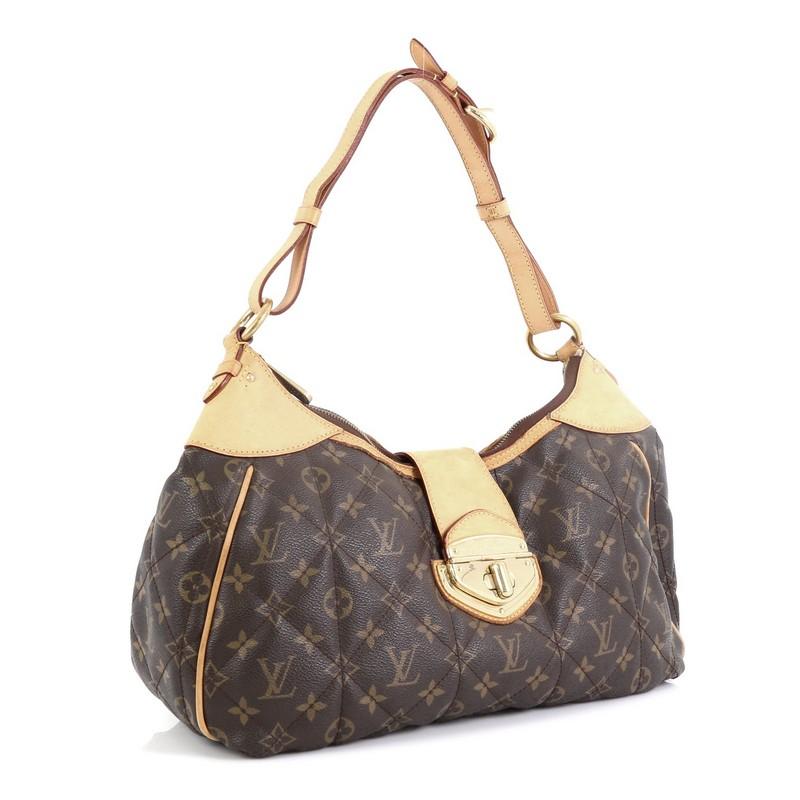 This Louis Vuitton City Handbag Monogram Etoile GM, crafted from brown quilted monogram coated canvas, features adjustable flat leather handle, signature vachetta cowhide leather trims and top corners and gold-tone hardware. Its turn-lock and zip