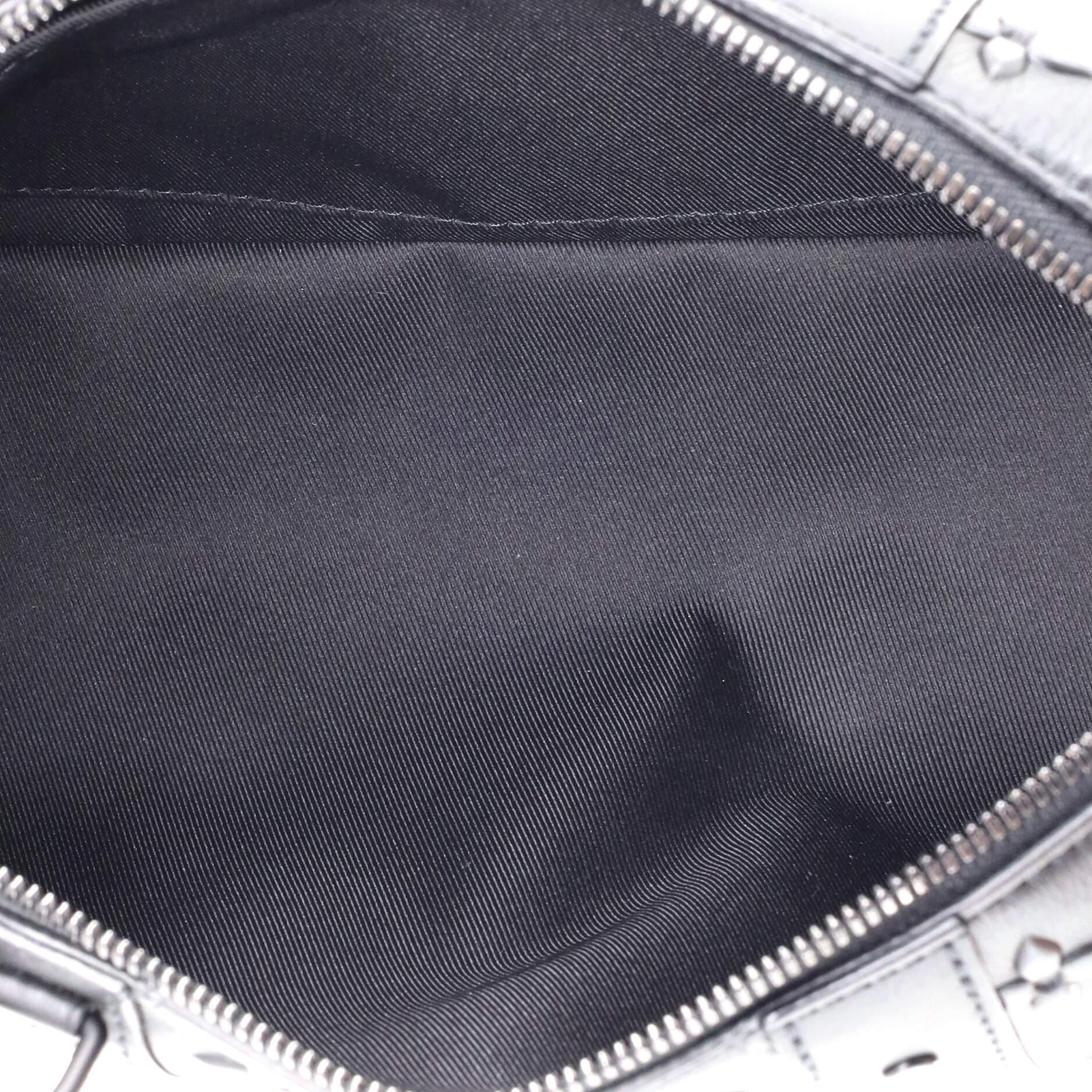 Louis Vuitton City Keepall Bag Monogram Seal Leather 1
