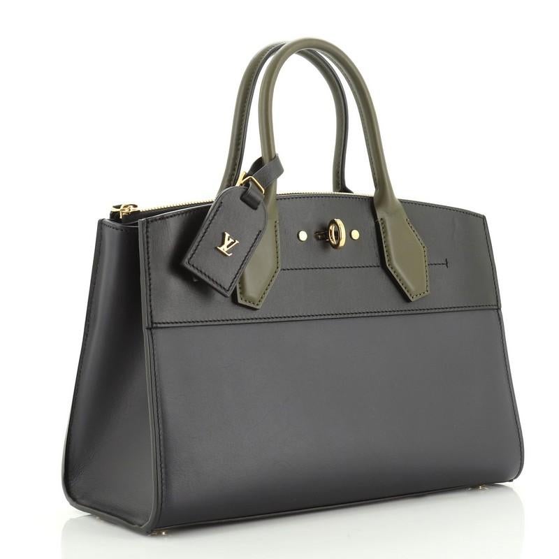 Estimated Retail Price: $4,150
Condition: Great. Small indentations and scuffs on exterior and in interior, minor wear on handles, scratches on hardware.
Accessories: Lock, Luggage Tag, With Strap
Measurements: Handle Drop 4