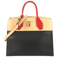 Louis Vuitton City Steamer Handbag Leather MM