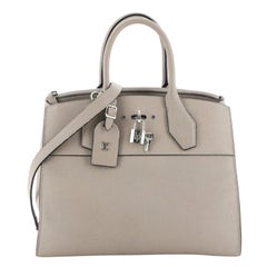 Louis Vuitton City Steamer Handbag Leather MM