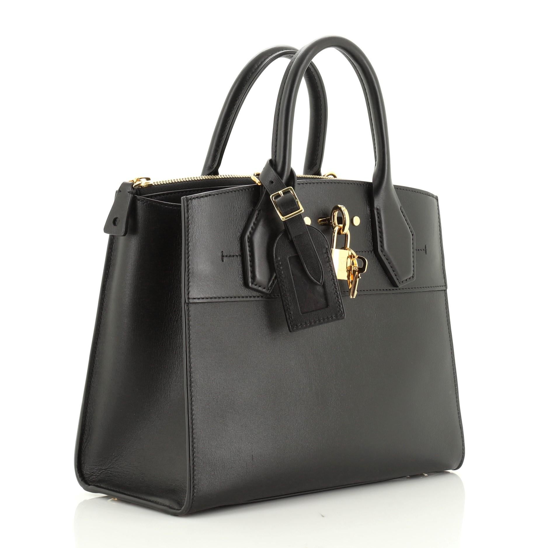 Estimated Retail Price: $3,700
Condition: Great. Scuffs on exterior and in interior, slight cracking on side opening edges, scratches on hardware.
Accessories: Keys, Lock, Luggage Tag, With Strap
Measurements: Handle Drop 3.5