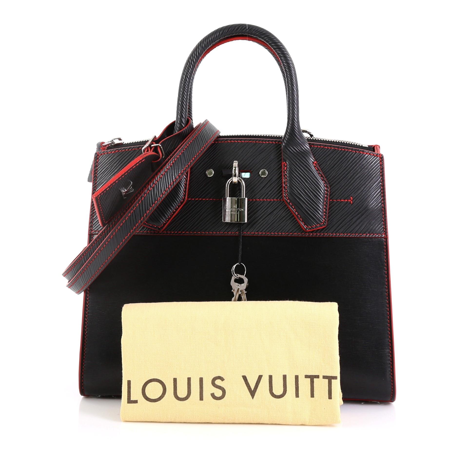 This Louis Vuitton City Steamer Handbag Smooth Calfskin with Epi Leather PM, crafted from black calfskin leather and epi leather, features dual rolled handles, front central lock with LV stamped logo, and silver-tone hardware. Its hook closure opens
