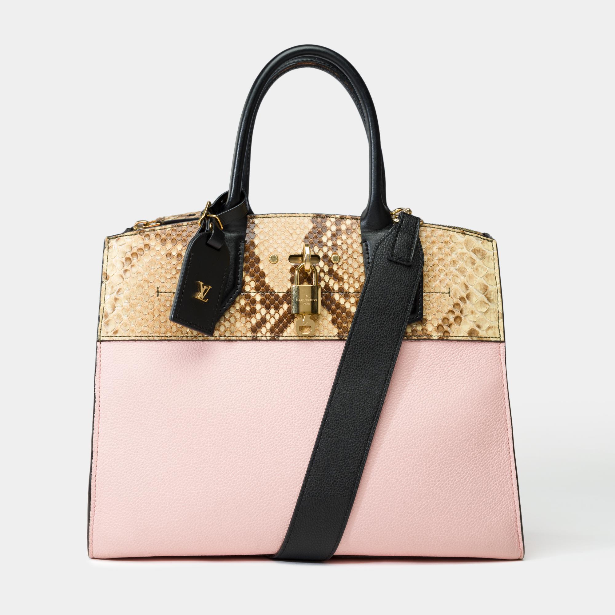 Splendid​ ​and​ ​rare​ ​Louis​ ​Vuitton​ ​City​ ​Steamer​ ​MM​ ​handbag​ ​strap​ ​in​ ​pink​ ​grained​ ​leather​ ​and​ ​Python,​ ​gold​ ​metal​ ​trim,​ ​a​ ​black​ ​grained​ ​leather​ ​shoulder​ ​strap​ ​for​ ​carrying​ ​hand,​ ​shoulder​ ​or​
