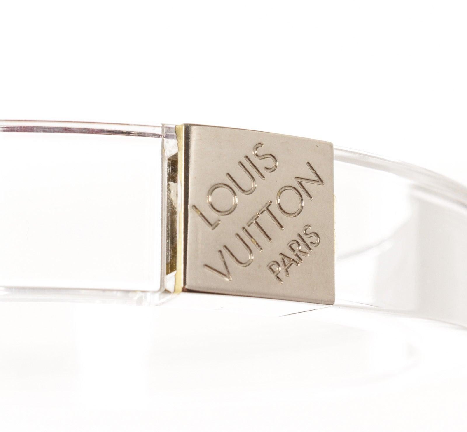 Louis Vuitton Clear Night Clubber Cuff Bangle Bracelet in clear acrylic resin has a silver-tone square engraved with 