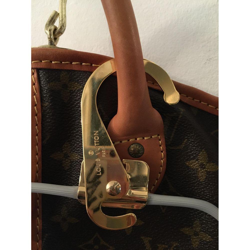 Louis Vuitton Cloth Travel Bag in Brown 4