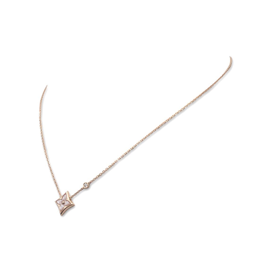 Authentic Louis Vuitton 'Color Blossom BB Star' pendant necklace crafted in 18 karat rose gold. The pendant is inspired by flower blossoms and its petals are set with mother-of-pearl. The delicate chain necklace also features a station with 1 round