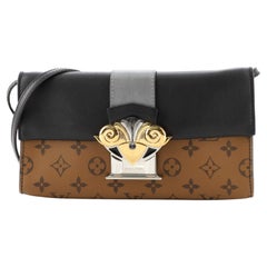 Louis Vuitton Column Clutch Reverse Monogram Canvas