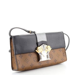 Louis Vuitton Column Clutch Reverse Monogram Canvas with Calfskin