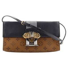 Louis Vuitton Column Clutch Reverse Monogram Canvas with Calfskin