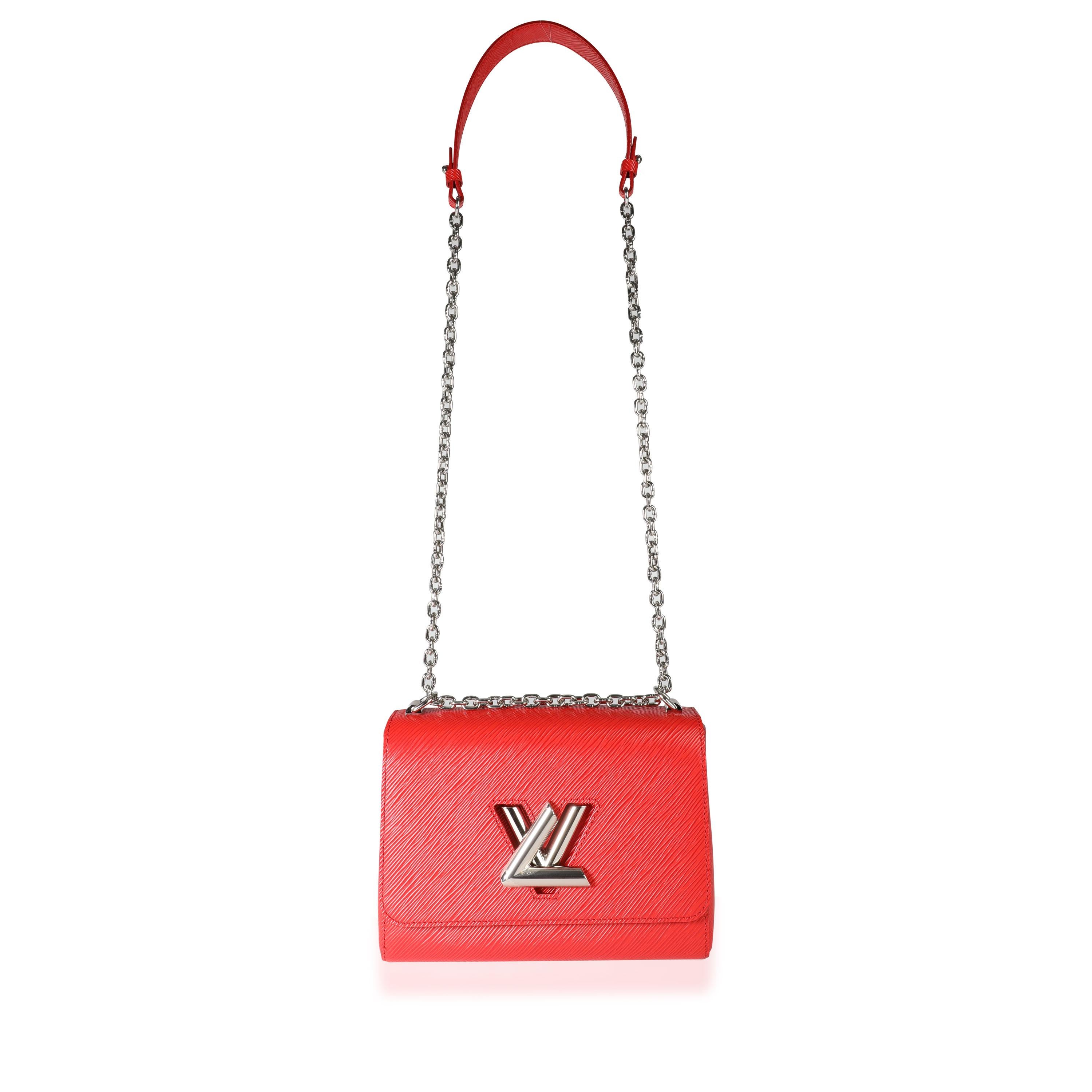 
Louis Vuitton Coquelicot Epi Leather Twist Chain MM
SKU: 113519
MSRP: USD 4,150.00
Condition: Pre-owned (3000)
Condition Description: The Louis Vuitton Twist Bag was first created for the 2015 Cruise show collection. Coming in a coqeulicot red Epi