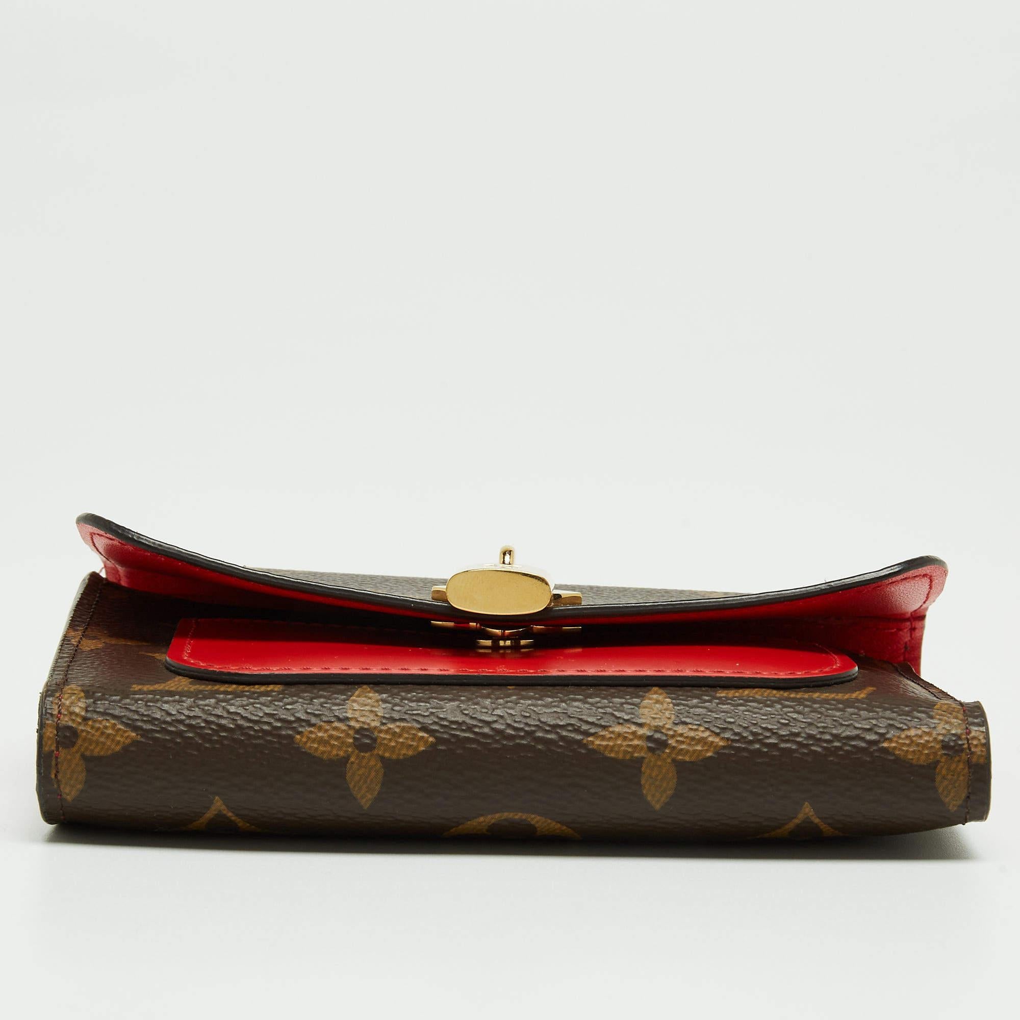 Crafted from the Monogram canvas, this Louis Vuitton wallet will add a statement appeal to your outfit. Its leather-lined interior is divided into different compartments for organized and safe storage of your monetary essentials.

