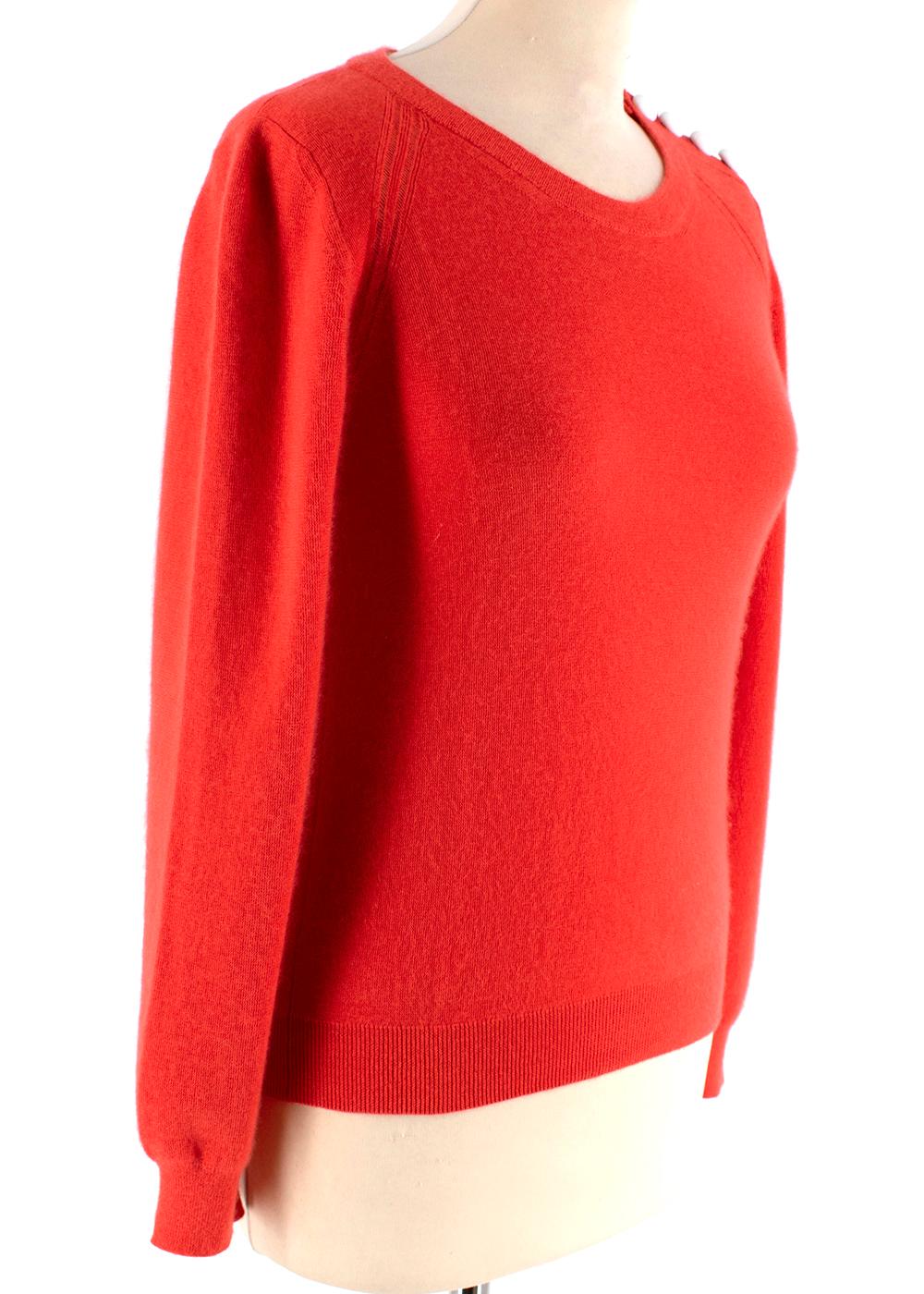 Louis Vuitton Coral Long-Sleeve Buttoned Jumper

- Soft cashmere blend 
- Coral pink knit 
- Long sleeves
- Ribbed neckline, sleeves and hem 
- Stitched LV emblem on lower body
- White contrast button fastening on shoulder 

THERE IS NO CARE LABEL,
